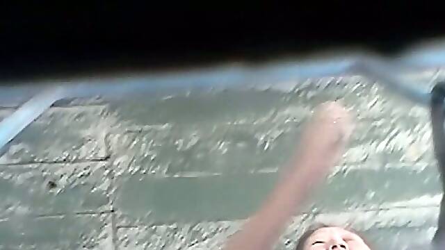 Hairy pussy of a mature Asian lady in the public toilet room