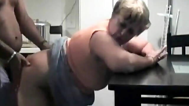 Curvy granny invites a black guy to fuck her from behind