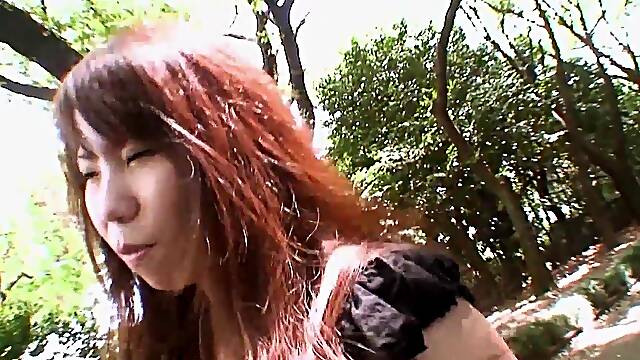 Pretty Asian brunette Rie Obata kneads her hairy pussy with a vibrator